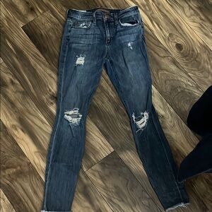 Distressed Blue Jeans